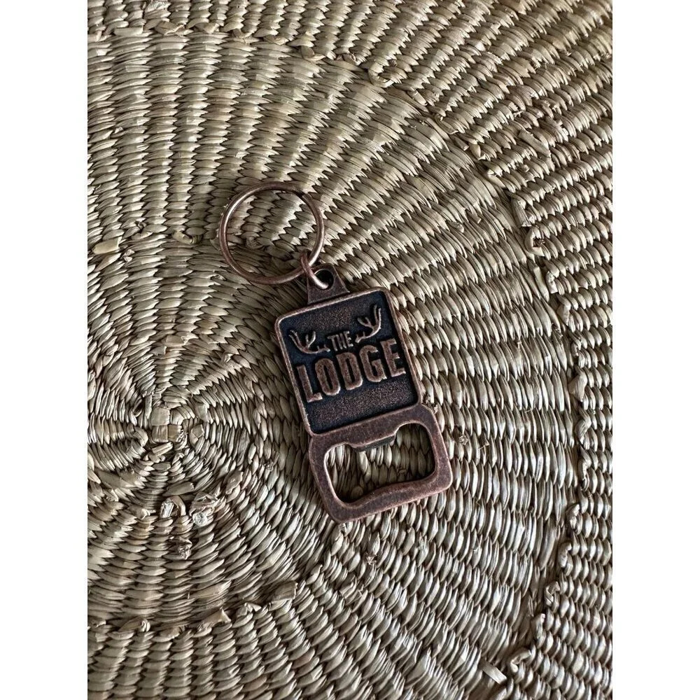 The Lodge metal bottle opener